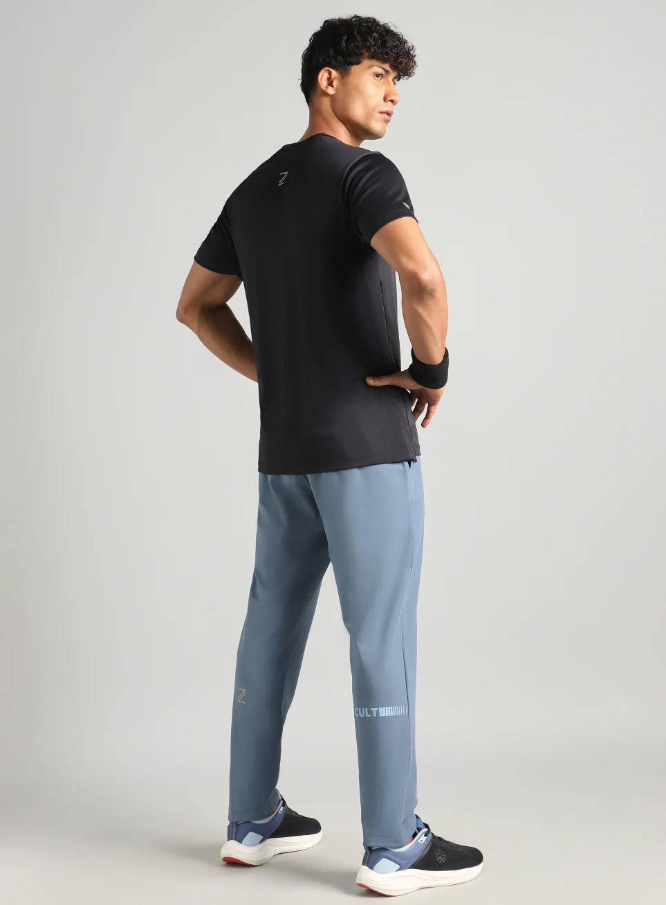 Men's Blue Runner's In Motion Graphic Trackpants - Image 2
