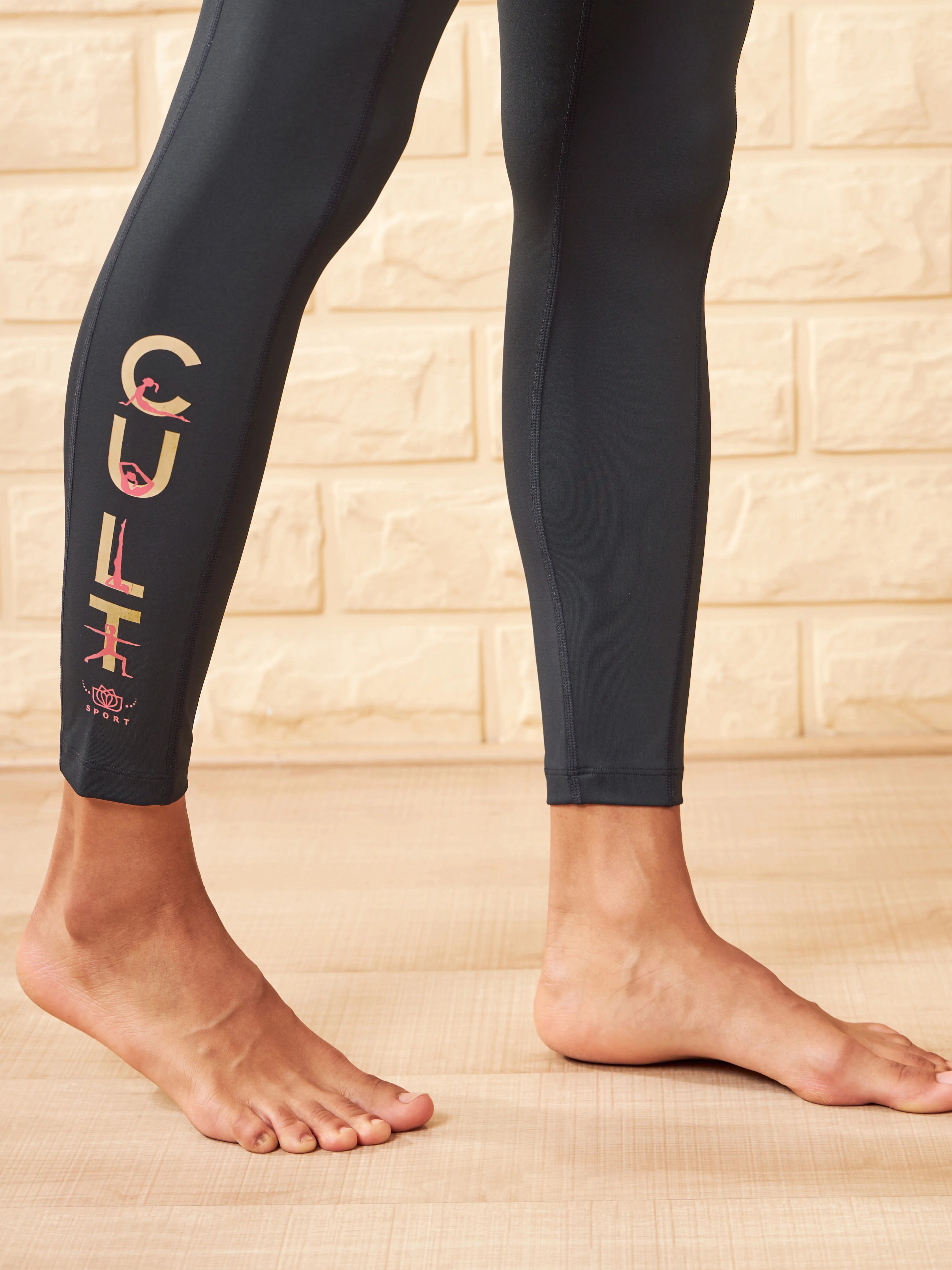 Solid Black Absolute Fit Yoga Tights with Logo Print - Image 5