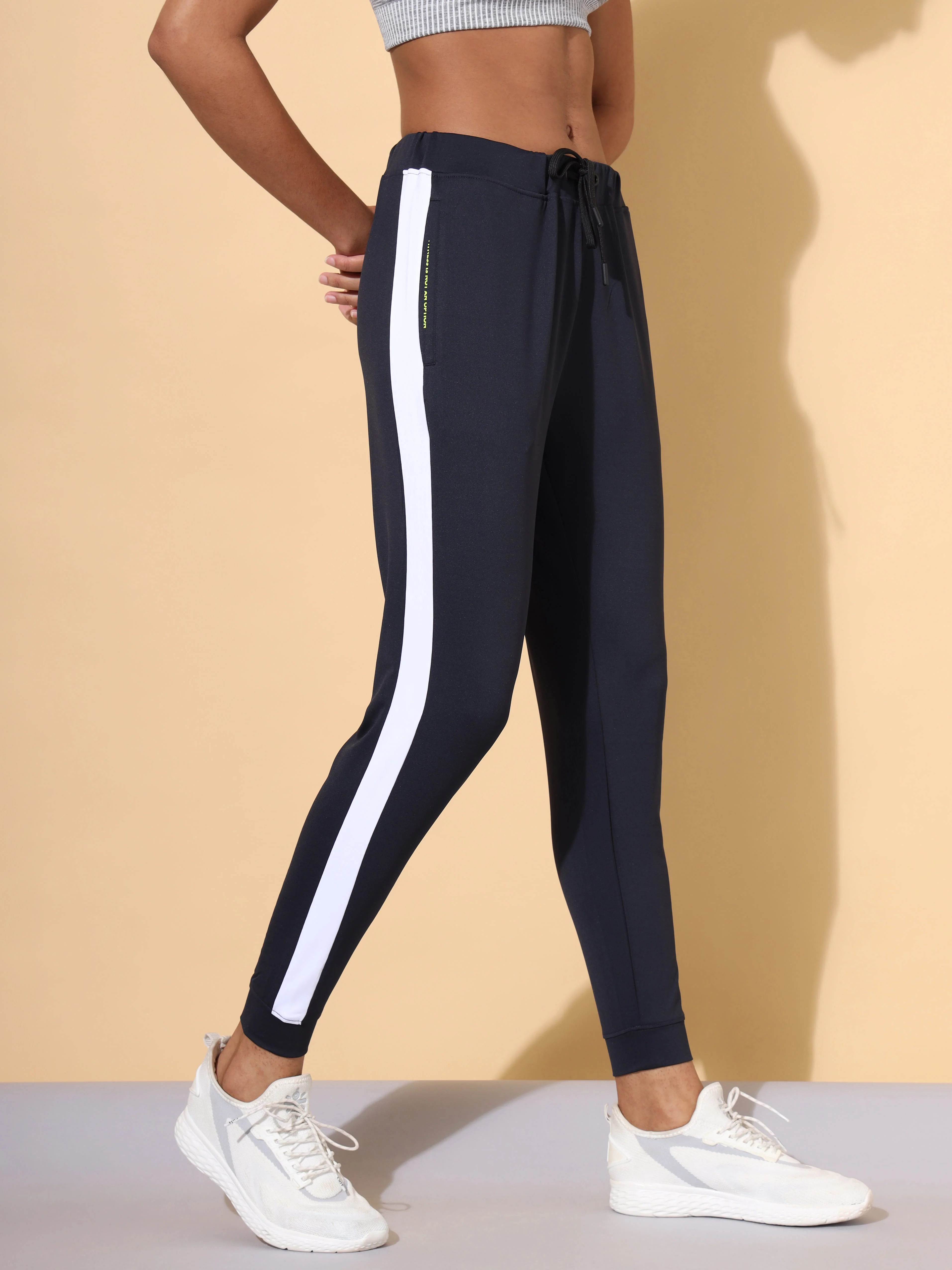 Women Blue Vitals Solid Running Joggers - Image 4