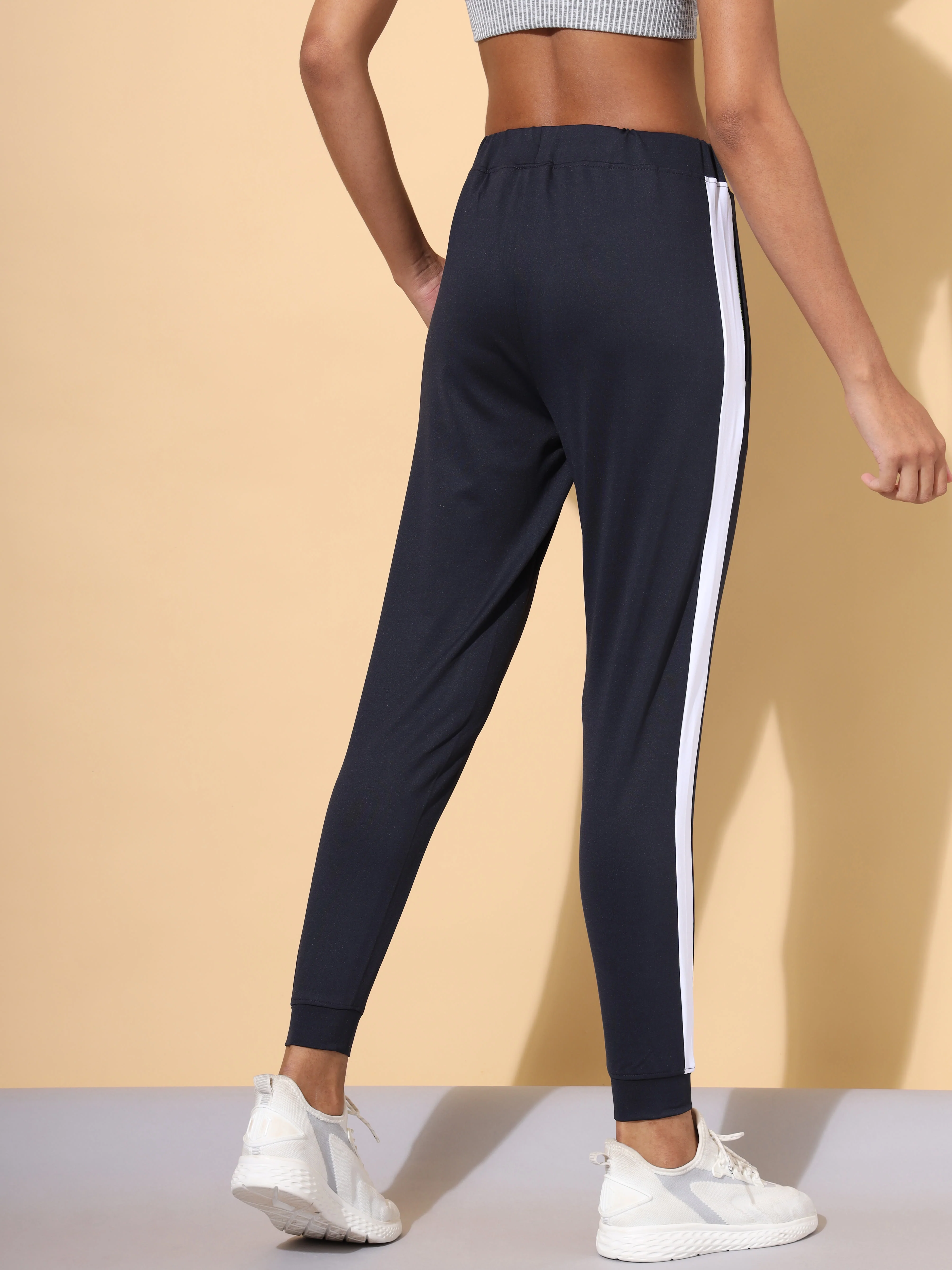 Women Blue Vitals Solid Running Joggers - Image 5